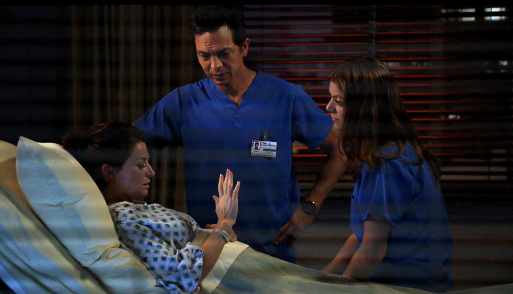 Still of Jake (played by Benjamin Bratt) and Addison (played by Kate Walsh) telling Amelia (played by Caterina Scorsone) that her baby died and donated all his organs from Private Practice 5x22