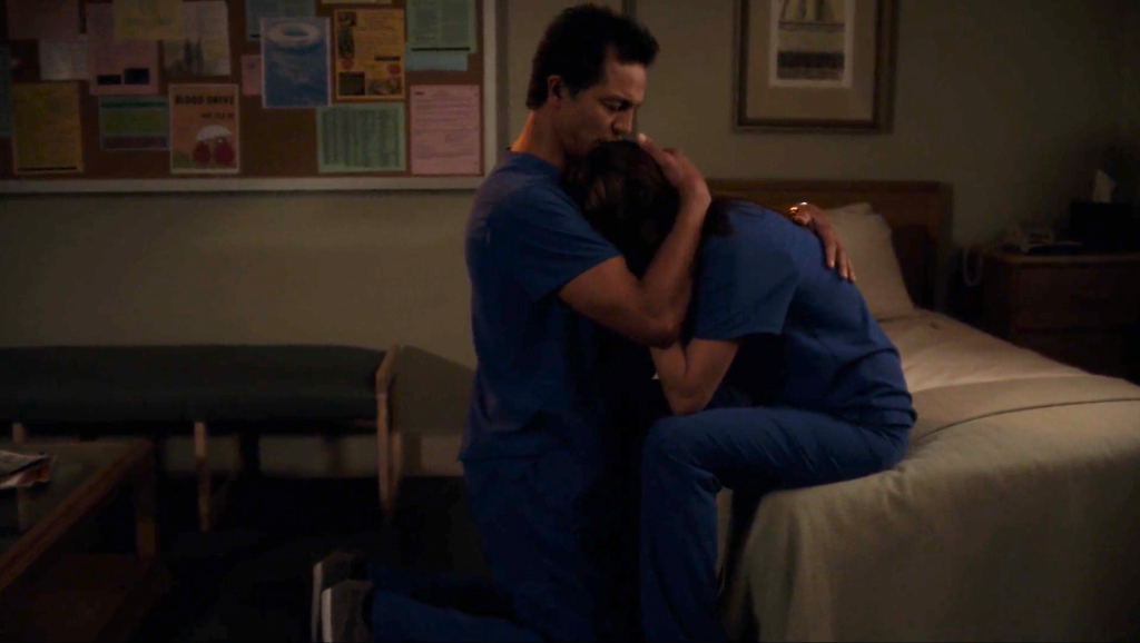 Still of Jake (played by Benjamin Bratt) comforting Addison (played by Kate Walsh) after doing Amelia's baby's surgery from Private Practice 5x22