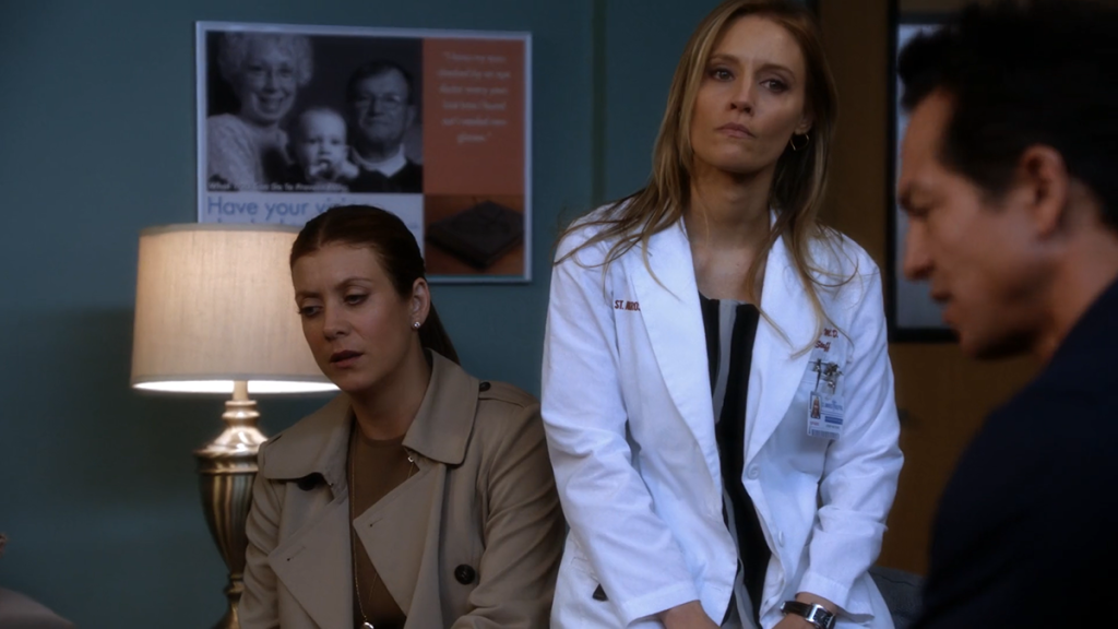 Still of Addison (played by Kate Walsh) and Charlotte (played by KaDee Strickland) reacting to the news of Amelia's plan while Jake (played by Benjamin Bratt) talks to Sam (played by Taye Diggs) (not pictured) from Private Practice 5x22