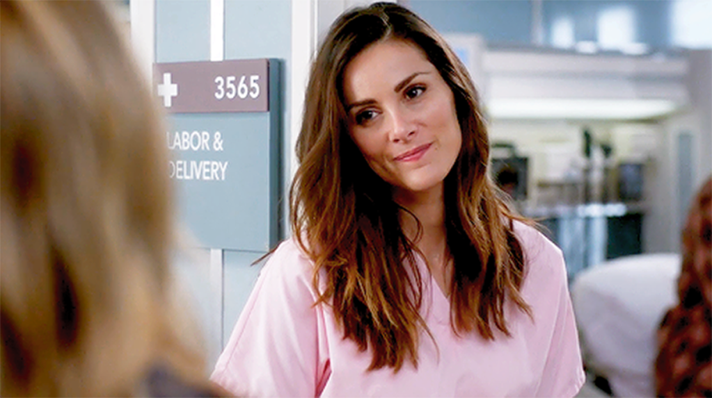Still of Carina (played by Stefania Spampinato) in pink scrubs from Grey's Anatomy